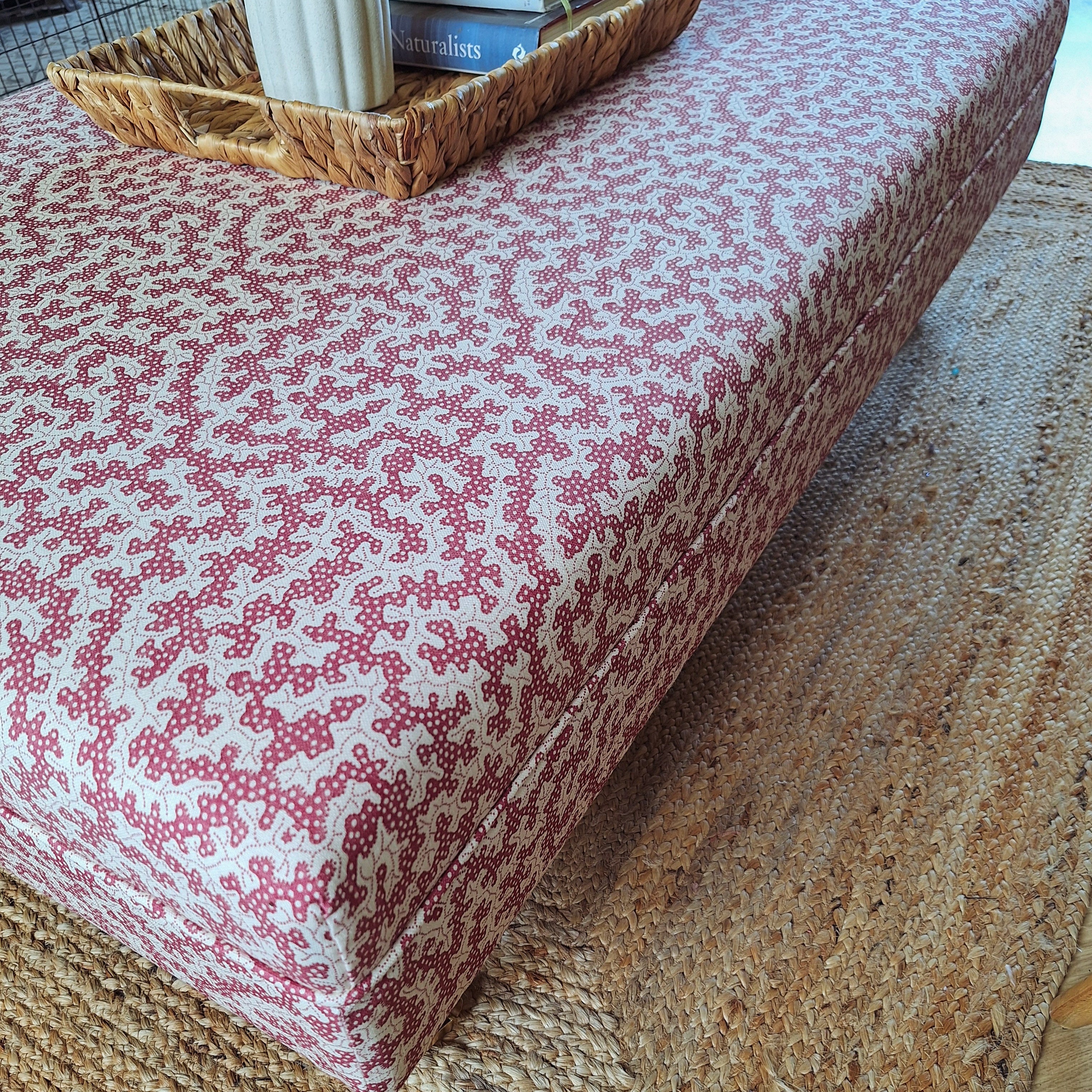 Sanderson truffle ottoman with turned legs and castors by North End Interiors