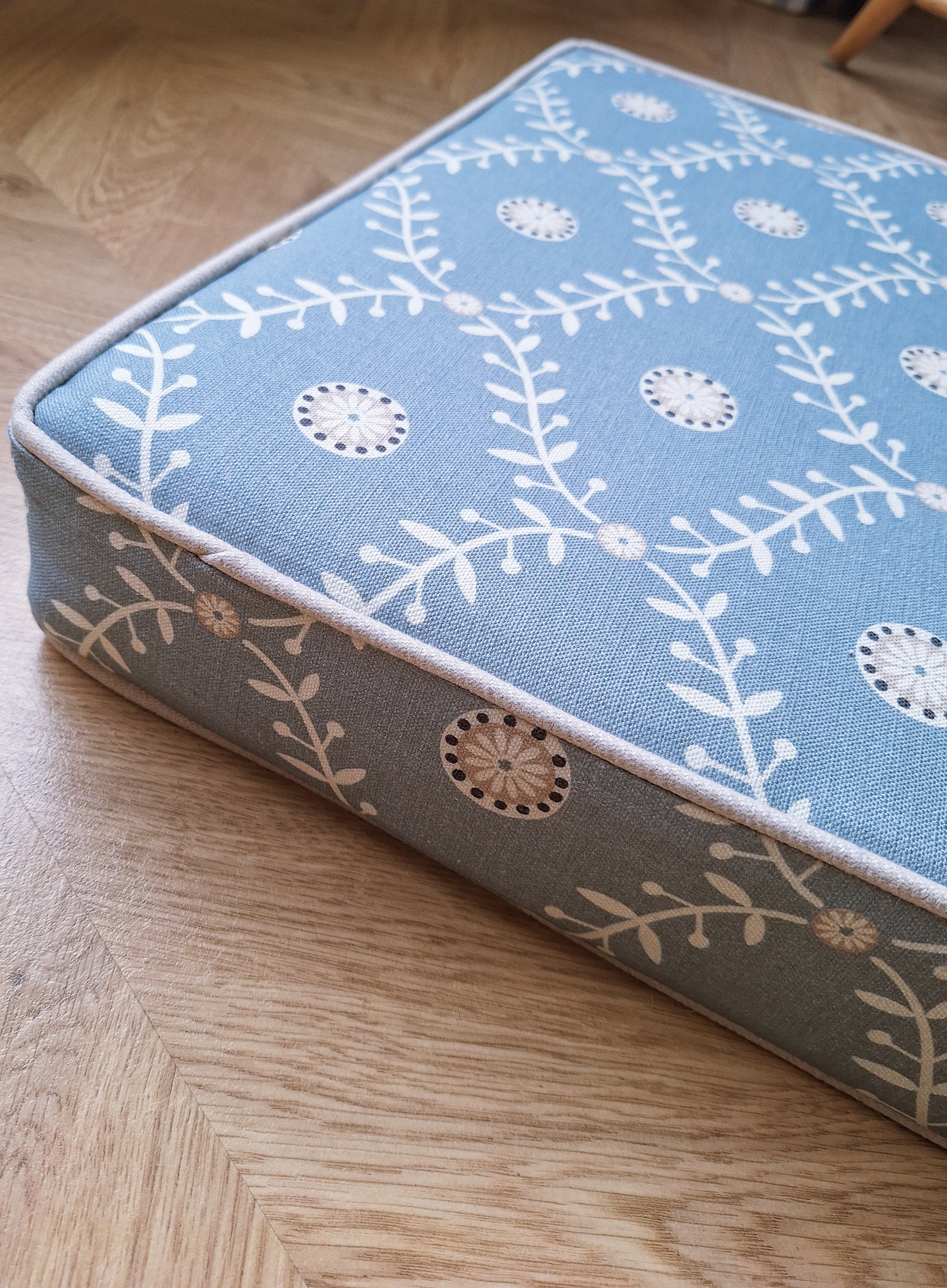 Made-to-order window seat cushion in patterned fabric for bay window seating